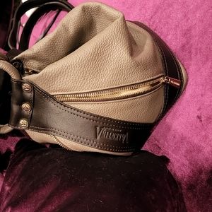 Valentina Carrano leather multi-functional backpack cross body bag